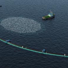 3d render of an ocean cleaning system with garbage on the water